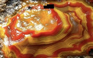 丹红流纹藏山海——精品战国红玛瑙对石赏析